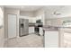 Modern kitchen featuring stainless steel appliances, granite countertops, and ample cabinet space at 27 Juniper Dr, Ocala, FL 34480