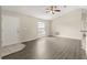 Inviting living room showcasing modern flooring, ample natural light, and a welcoming entrance at 27 Juniper Dr, Ocala, FL 34480