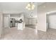 Spacious open floorplan with tile flooring, a modern kitchen, and plenty of natural light at 27 Juniper Dr, Ocala, FL 34480