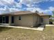 Home exterior showing back patio, yard and back entrance at 2730 Sw 173Rd Place Rd, Ocala, FL 34473