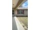Charming front exterior view of a well-maintained home with a walkway, window, and manicured lawn at 2730 Sw 173Rd Place Rd, Ocala, FL 34473