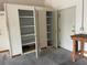 Organized garage with built-in storage cabinets, shelves, and a workbench, maximizing space and functionality at 2730 Sw 173Rd Place Rd, Ocala, FL 34473