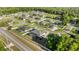 An elevated view showcases a suburban community, displaying well-maintained homes, and expansive green spaces at 4020 Se 23Rd St, Ocala, FL 34471