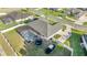The overhead view captures a fenced backyard with a screened pool, a trampoline, and a covered boat at 4020 Se 23Rd St, Ocala, FL 34471