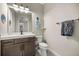 Bathroom featuring a tile floor, a vanity with a sink and a toilet at 4020 Se 23Rd St, Ocala, FL 34471