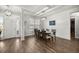 Elegant dining room with hardwood floors, a large table, and natural light at 4020 Se 23Rd St, Ocala, FL 34471