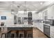 Well-equipped kitchen with granite countertops, stainless steel appliances, and center island at 4020 Se 23Rd St, Ocala, FL 34471