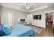 Spacious main bedroom featuring tray ceilings, closet access, and neutral color palette at 4020 Se 23Rd St, Ocala, FL 34471