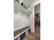 Inviting mudroom with custom bench, cubbies, and ample storage for organizing essentials at 4020 Se 23Rd St, Ocala, FL 34471