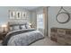 Cozy bedroom featuring neutral decor, comfortable bedding, and lots of natural light at 4188 Sw 53Rd Lane Rd, Ocala, FL 34474