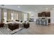 Open-concept living space with a kitchen, dining area, and living room, creating an inviting atmosphere at 4188 Sw 53Rd Lane Rd, Ocala, FL 34474