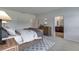Serene bedroom features wood furniture, plush bedding, and ensuite bathroom access at 4188 Sw 53Rd Lane Rd, Ocala, FL 34474