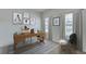 Bright home office featuring a wooden desk, comfortable chair, and ample natural light from the large windows at 4188 Sw 53Rd Lane Rd, Ocala, FL 34474