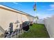 View of the backyard, showing the side of the home with equipment at 4398 Ne 29Th St, Ocala, FL 34470