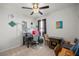 Bedroom with a desk, a chair, and decorative wall hangings, perfect for a study or creative space at 4398 Ne 29Th St, Ocala, FL 34470