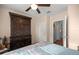 Bedroom featuring an armoire and a doorway, with natural light highlighting the space at 4398 Ne 29Th St, Ocala, FL 34470