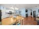 Eat-in kitchen featuring pendant lighting, dining table, and views to adjoining spaces at 4398 Ne 29Th St, Ocala, FL 34470