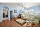 Bright living room with hardwood floors, comfortable seating, and natural light, perfect for relaxation at 4398 Ne 29Th St, Ocala, FL 34470