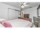 Bedroom with a large closet, traditional furniture, and neutral decor at 6127 Sw 84Th Place Rd, Ocala, FL 34476