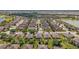 An impressive aerial view of a residential community with lush landscaping and orderly street layouts at 7432 Sw 98Th Ave, Ocala, FL 34481