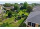 Charming backyard featuring a lush lawn, well-placed shrubs, and landscaping at 7432 Sw 98Th Ave, Ocala, FL 34481