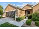 Inviting home exterior showcases manicured shrubs and a covered front entrance at 7432 Sw 98Th Ave, Ocala, FL 34481