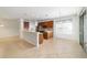 Open kitchen flows to living area, with breakfast bar, stainless appliances and ample cabinet space at 7432 Sw 98Th Ave, Ocala, FL 34481