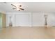 Spacious living room featuring tile flooring and ample natural light at 7432 Sw 98Th Ave, Ocala, FL 34481
