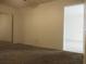 This is a bedroom with a carpeted floor and a mirrored closet at 8132 Fairways Cir # R103, Ocala, FL 34472