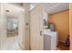 Conveniently located laundry room with washer, dryer, and easy access to the rest of the home at 8625 Sw 94Th Ln # D, Ocala, FL 34481