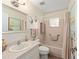 Clean bathroom featuring a shower and bathtub combo at 8833 Sw 98Th Street Rd # E, Ocala, FL 34481