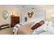 Comfortable bedroom featuring a full sized bed and carpet at 8833 Sw 98Th Street Rd # E, Ocala, FL 34481