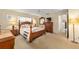 Bright bedroom with a comfortable queen-sized bed and closet nearby at 8833 Sw 98Th Street Rd # E, Ocala, FL 34481