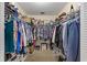 Spacious walk-in closet offering ample storage for clothing and accessories at 8833 Sw 98Th Street Rd # E, Ocala, FL 34481