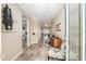 Inviting entryway featuring tile floors, decorative furnishings, and an open floor plan at 8878 Sw 103Rd Cir, Ocala, FL 34481