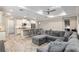 Open concept living space featuring modern furnishings, a stylish kitchen and dining area for entertaining at 8878 Sw 103Rd Cir, Ocala, FL 34481