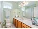 Bathroom with wood vanity, and decorative fish accents at 8904 Sw 84Th Cir, Ocala, FL 34481