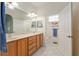 Bright bathroom with double sink vanity and separate toilet room at 8904 Sw 84Th Cir, Ocala, FL 34481