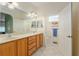 Bright bathroom with double sink vanity and separate toilet room at 8904 Sw 84Th Cir, Ocala, FL 34481