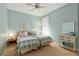 Bedroom with ceiling fan, two twin beds, and carpeted floors at 8904 Sw 84Th Cir, Ocala, FL 34481