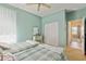 Bedroom with ceiling fan, two twin beds, and carpeted floors at 8904 Sw 84Th Cir, Ocala, FL 34481