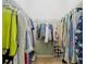 Walk-in closet with plenty of hanging storage and carpeted floor at 8904 Sw 84Th Cir, Ocala, FL 34481