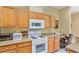 Well-equipped kitchen with ample counter space, and natural wooden cabinets at 8904 Sw 84Th Cir, Ocala, FL 34481
