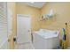 Laundry room with full size white washer and dryer at 8904 Sw 84Th Cir, Ocala, FL 34481