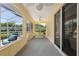 Covered patio with seating area and view of the backyard, great for outdoor relaxation at 8904 Sw 84Th Cir, Ocala, FL 34481