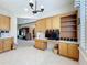 Bright office space featuring custom cabinets, desk and shelving with modern lighting at 9347 Se 137Th Street Rd, Summerfield, FL 34491