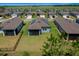 Aerial view of a single-Gathering home in a Primary-planned community with solar panels at 9388 Sw 53Rd Pl, Ocala, FL 34481