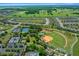 Extensive neighborhood with a baseball field and tennis courts at 9388 Sw 53Rd Pl, Ocala, FL 34481