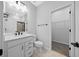 Modern bathroom featuring sleek vanity, updated fixtures, and a walk-in shower at 9388 Sw 53Rd Pl, Ocala, FL 34481