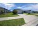 Charming single-story home featuring a well-manicured lawn and an attached two-car garage at 9388 Sw 53Rd Pl, Ocala, FL 34481